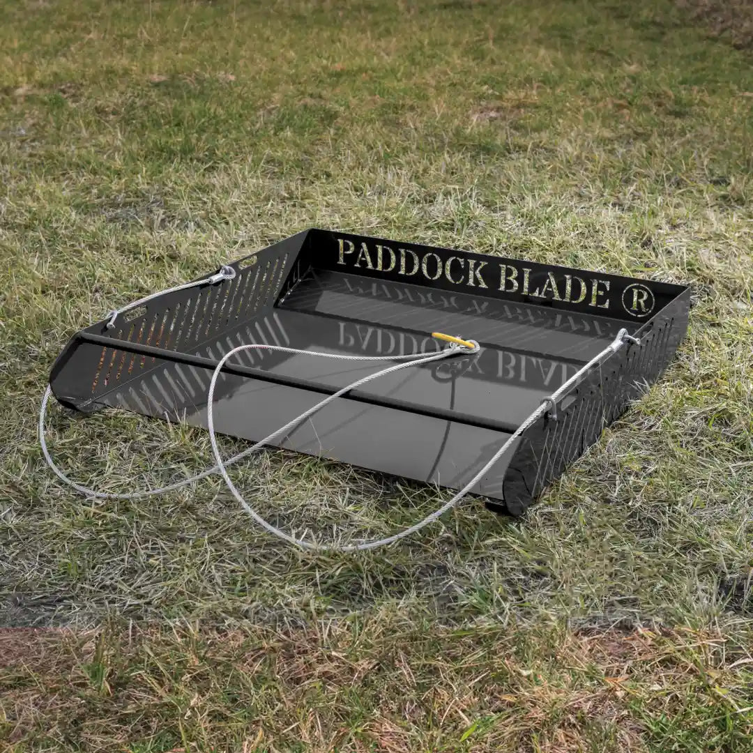 Paddock Blade Magnum black horse paddock cleaner with ergonomic handle and sturdy design, ideal for efficient cleaning.
