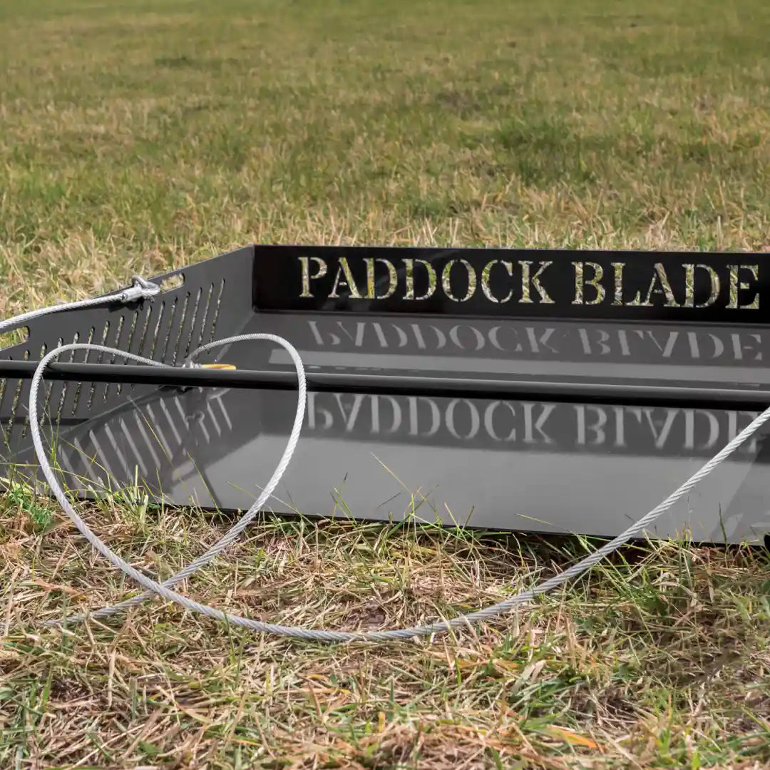 Paddock Blade Magnum black horse paddock cleaner with sturdy handle and wide scoop for efficient cleaning.