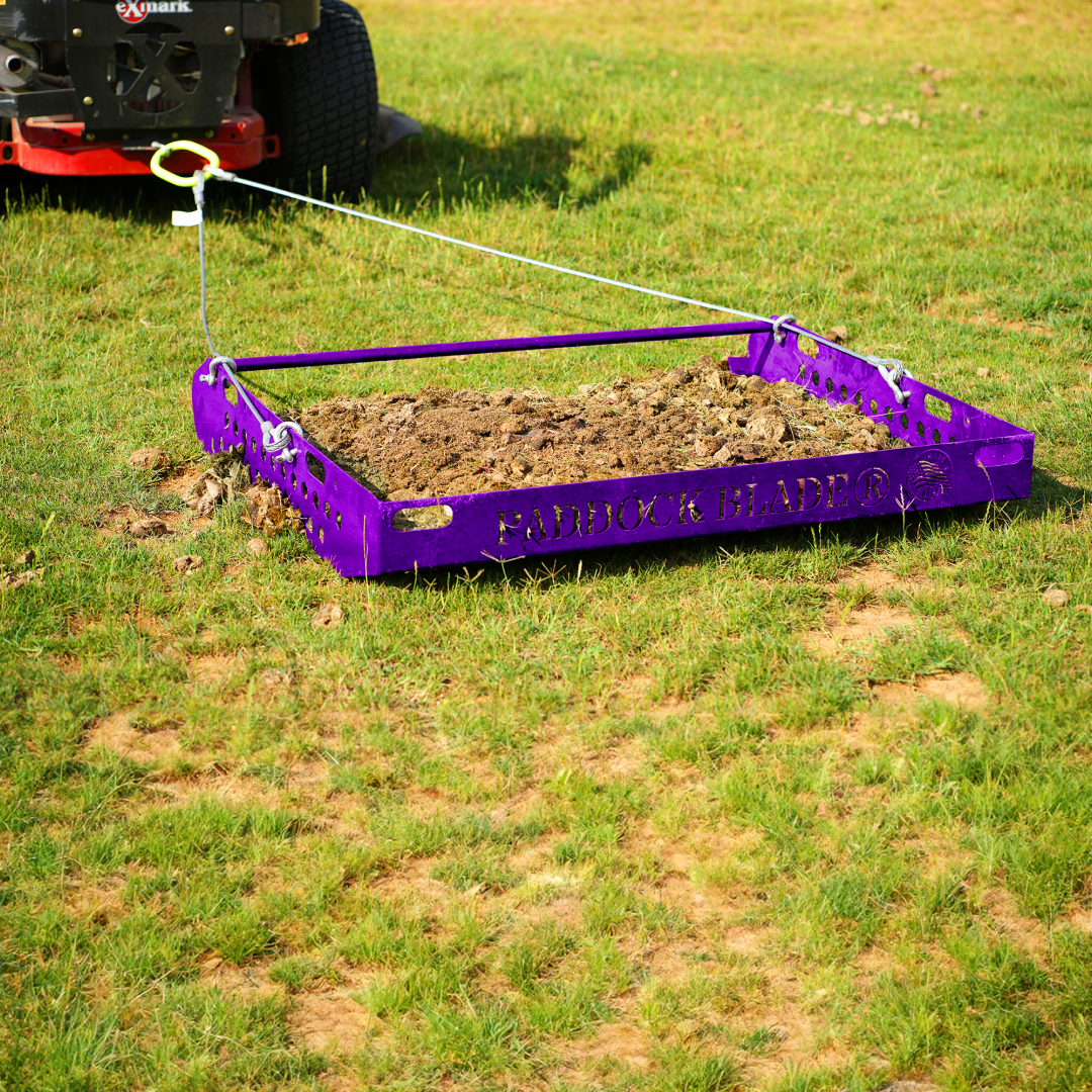 Plum purple Paddock Blade horse paddock cleaner, featuring a sturdy design for efficient cleaning in equestrian settings.