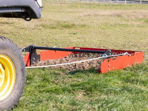 manure collection tool full of horse manure
