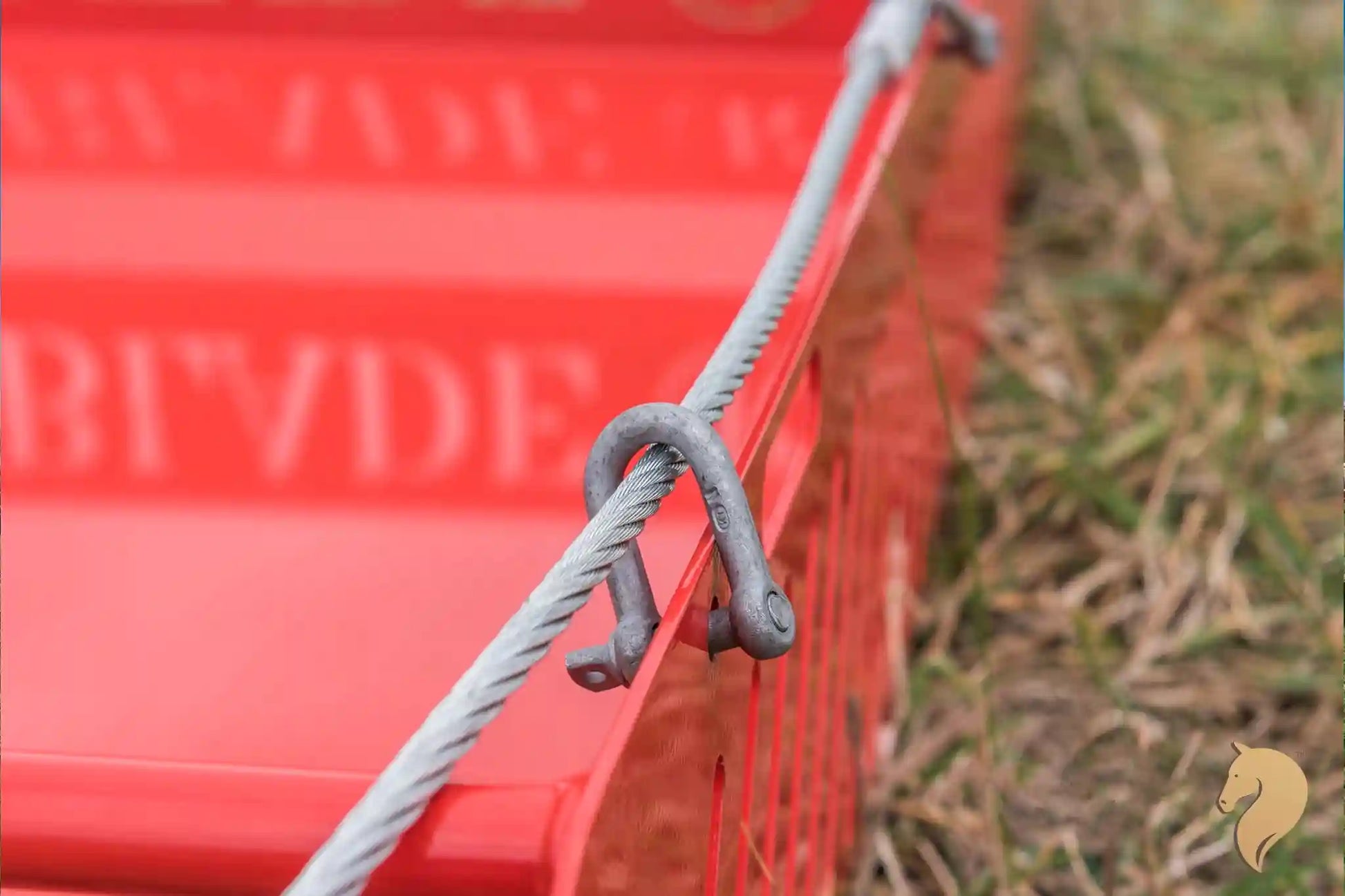 Paddock Blade horse paddock cleaner in signal red, British-made, with a sturdy metal blade for yard and paddock maintenance.