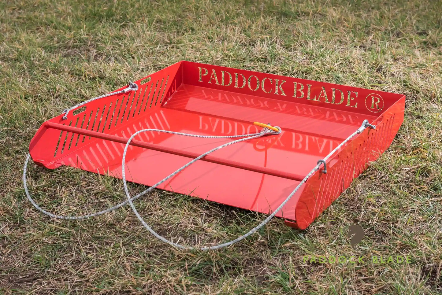 Red Paddock Blade horse paddock cleaner by Paddock Blade UK, premium British-made tool for efficient paddock maintenance.